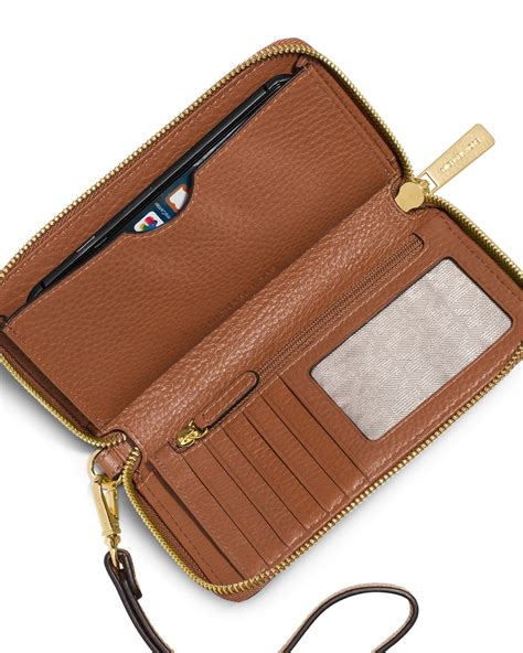 michael kors phone wallet amazon|Michael Kors multifunction wallet.